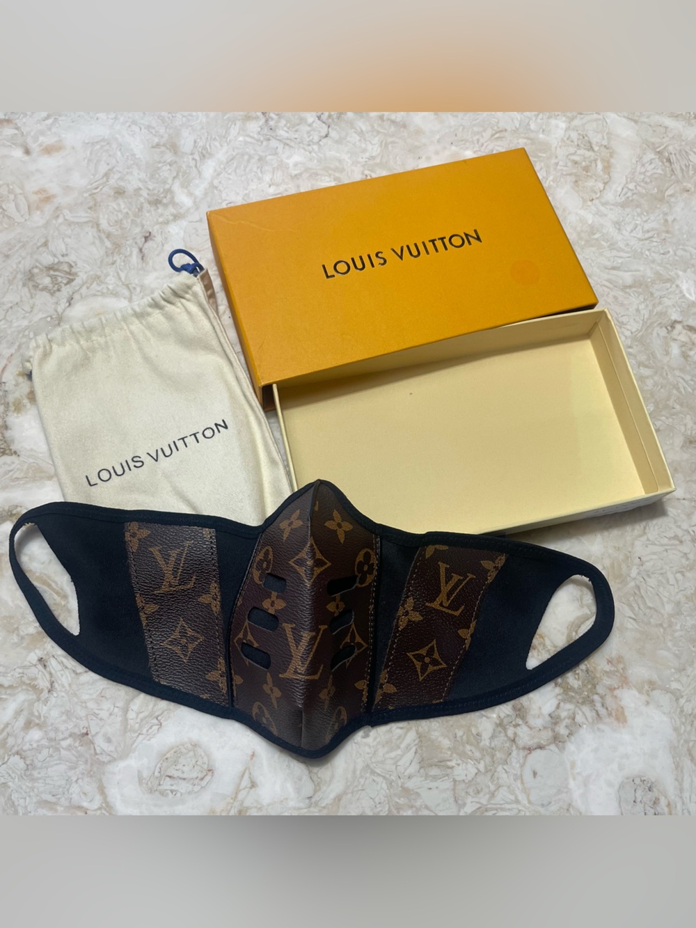 Louis Vuitton genuine leather mask with original box & bag. Excellent condition